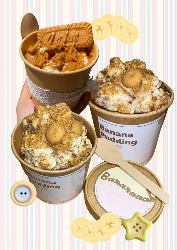 Hero shot: a Bananaaah tub with the lid off, creamy top, banana slices and biscuit showing, shot from just above